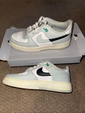 Nike Low-Top Sneakers White Light Gray with Black Swoosh. 7y and 8.5 women sizes